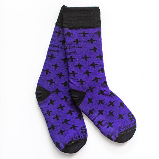 a pair of purple socks with black crosses on them